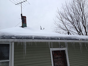 A home with an ice dam problem A home with an ice dam problem