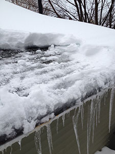 Ice Dam removal close-up Ice Dam removal close-up