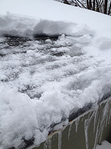 Ice Dam removal close-up Ice Dam removal close-up